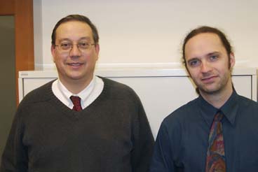Photograph of Jon Doyle and Michael McGeachie after the McGeachie dissertation defense